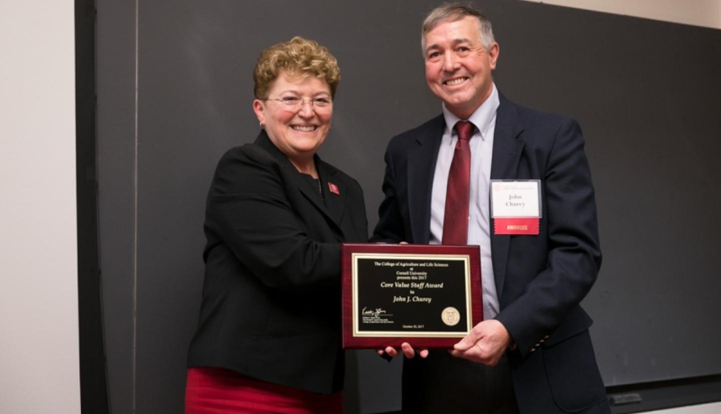 Dean Boor shakes hands with Churey
