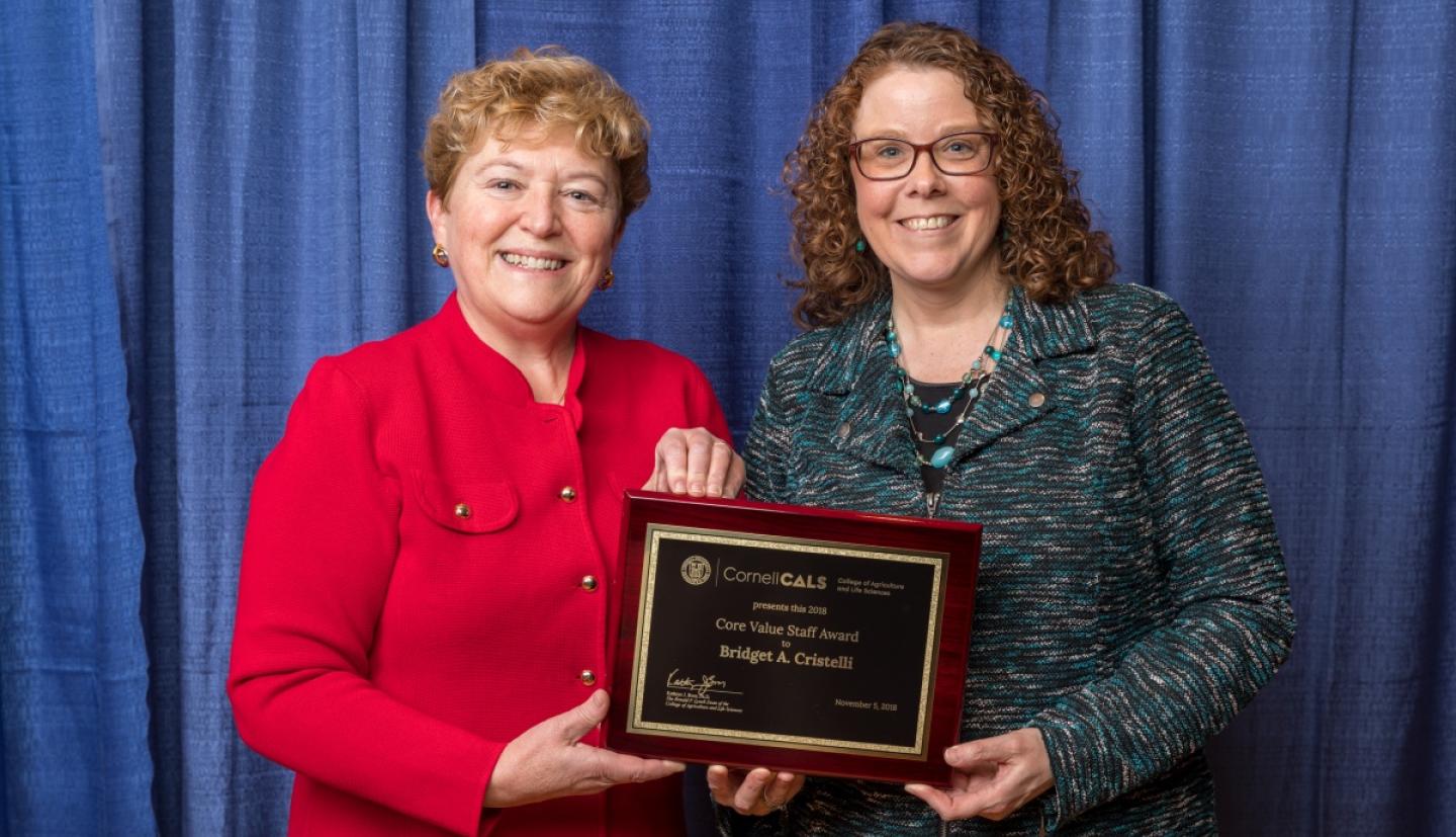 Dean Boor presents Bridget Cristelli with award
