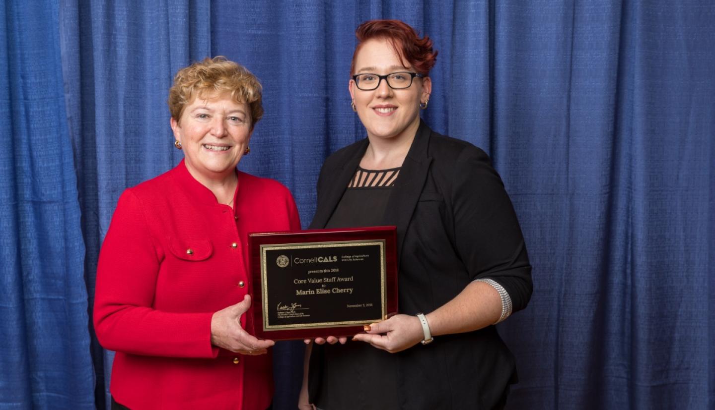 Dean Boor presents Marin Cherry with award