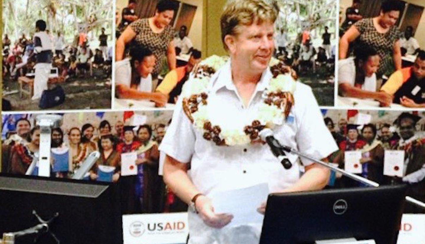 Bruce Monger addresses students and officials 