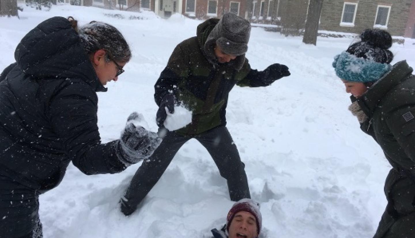 Brady Bunkelman, Jamie Hom and Madhur Srivastava playing in snow