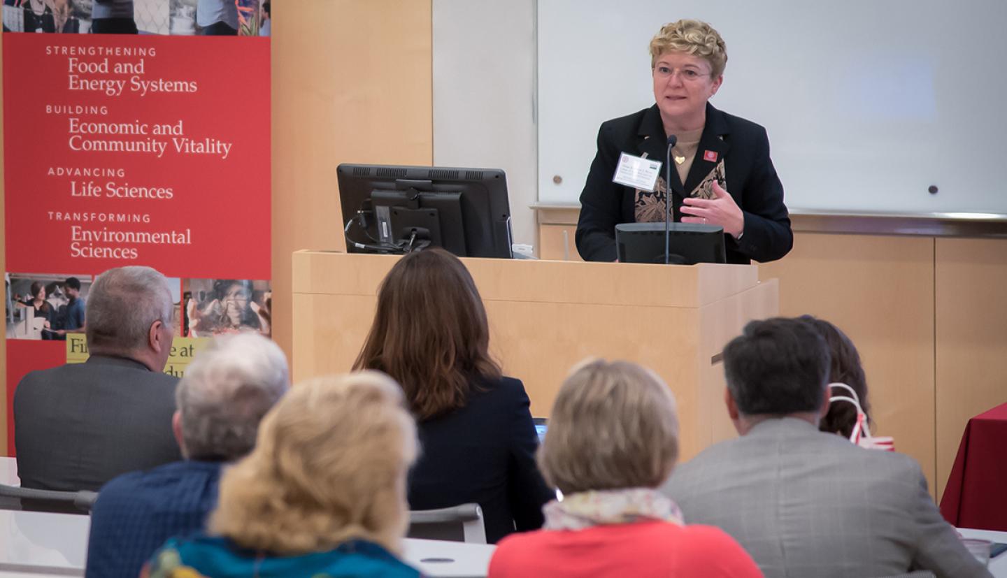 Dean Boor speaks at a podium