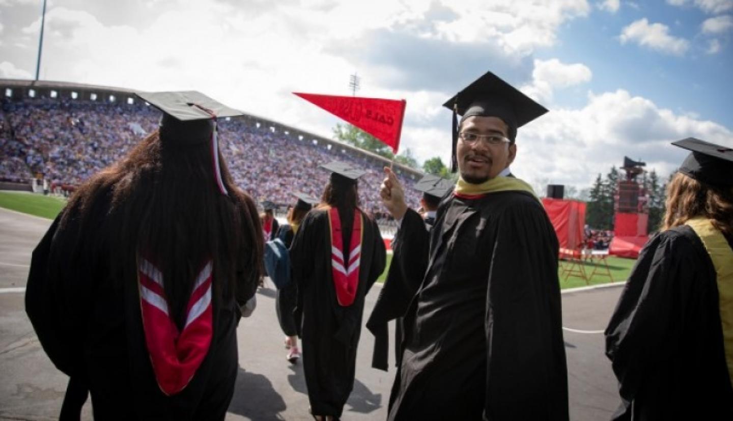 Graduating students enter stadium
