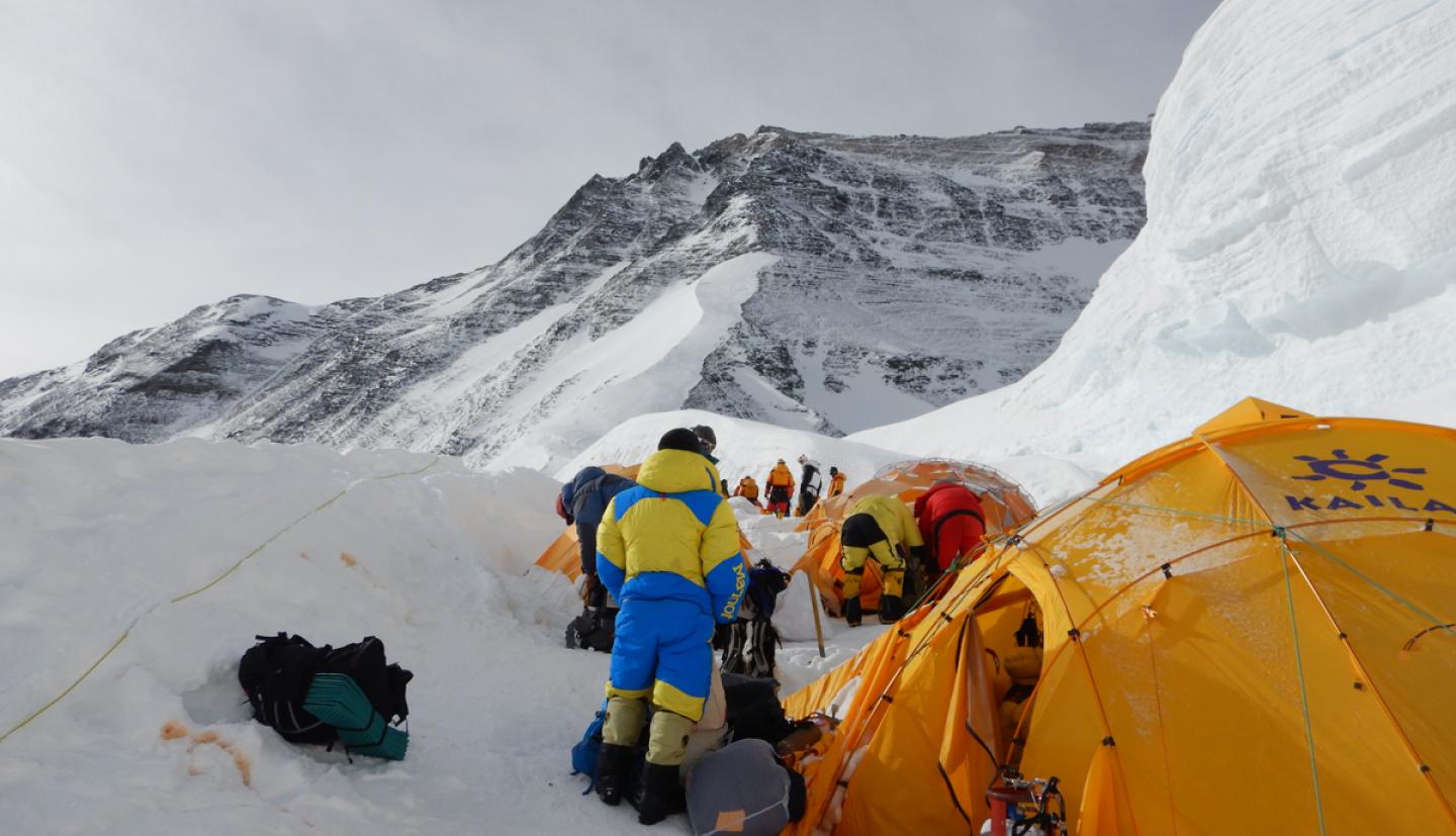 Tents and climbers at base of Everest