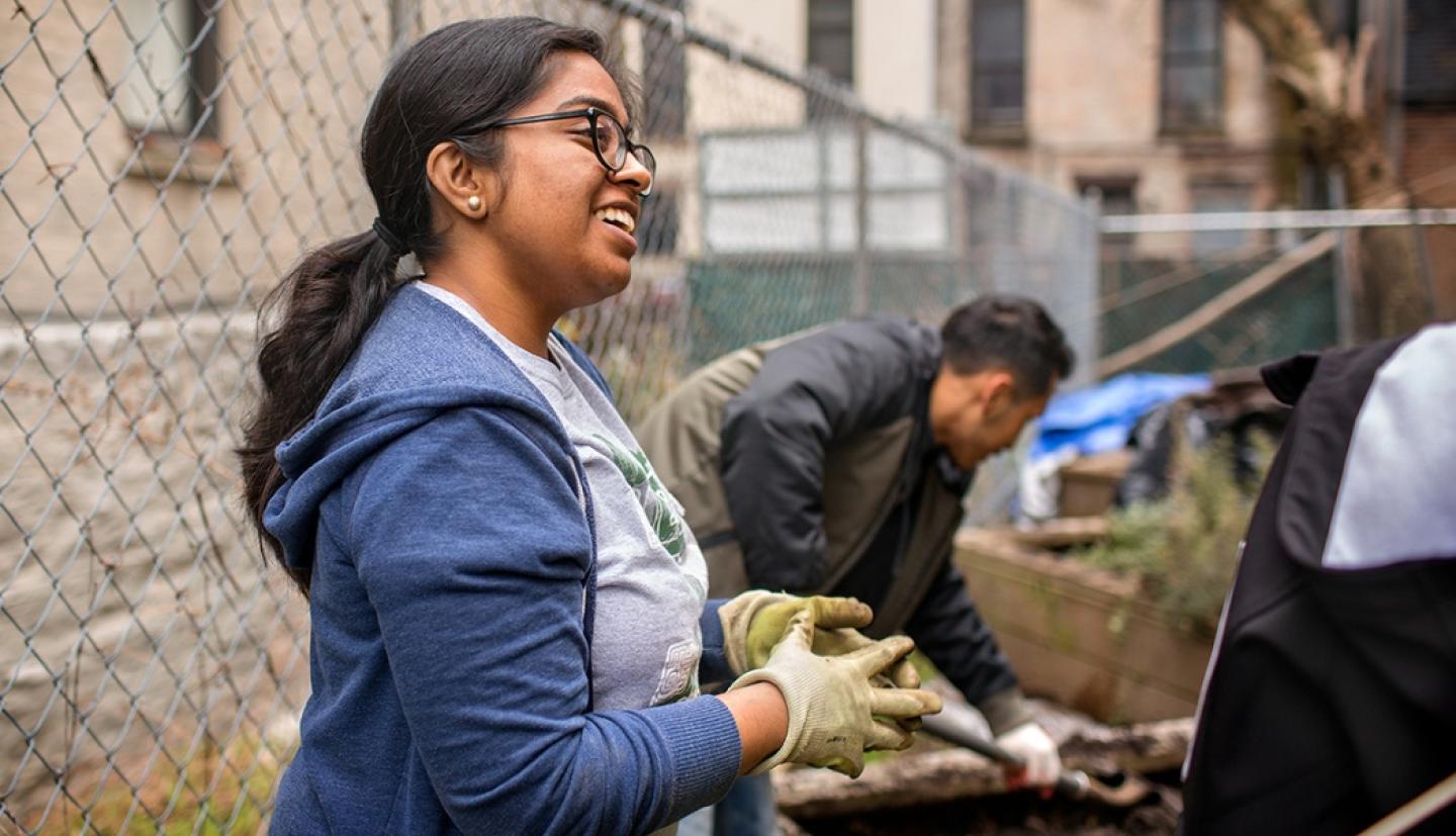 Lavannya Pulluveetil Barrera talks with a co-worker during her Alternative Breaks trip to New York City