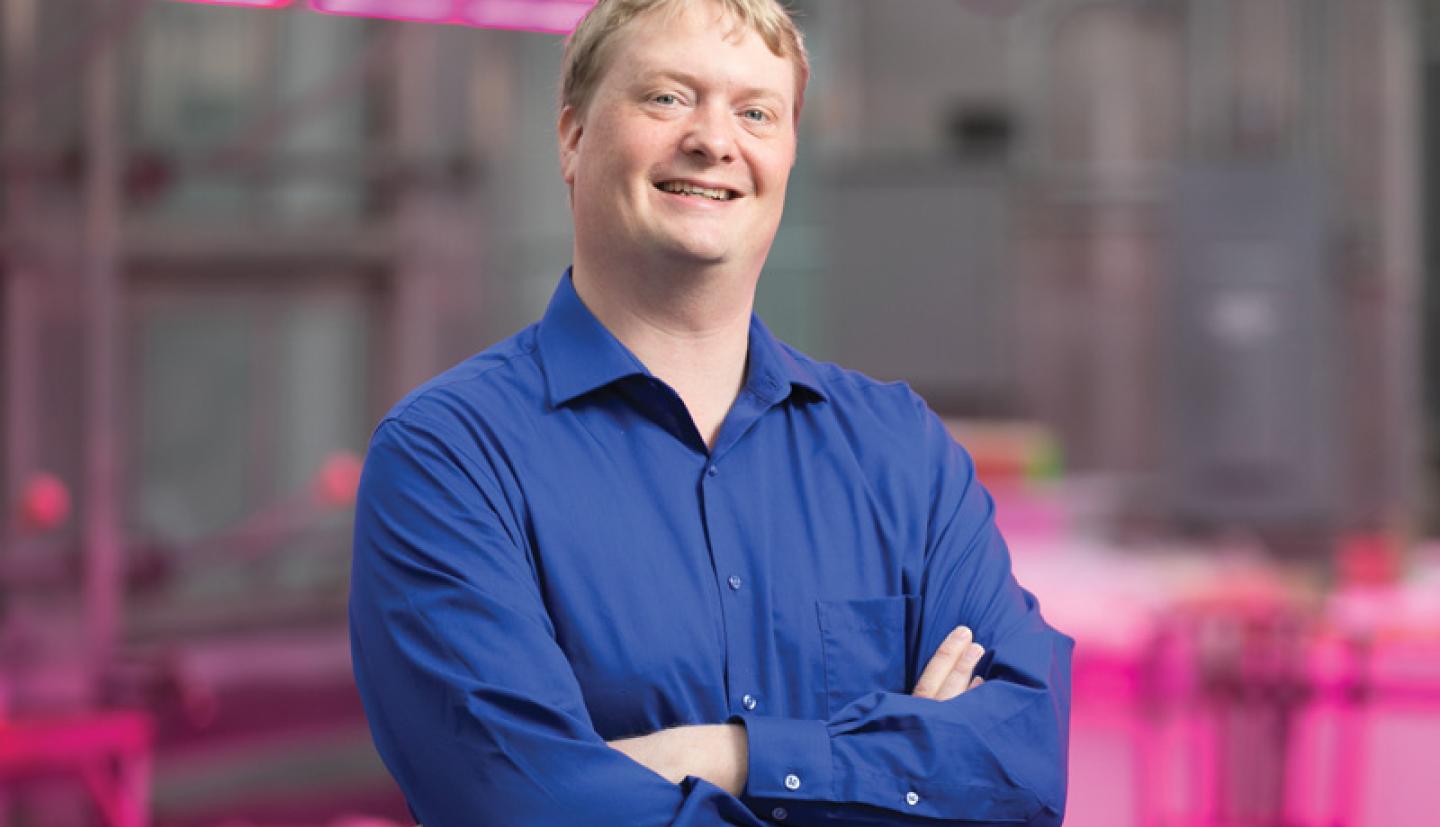 Man crossing arms standing