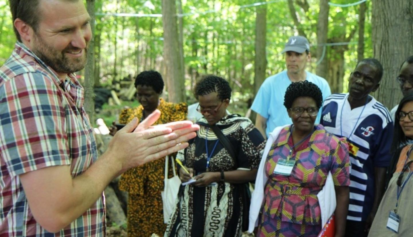 ELC members standing in woods