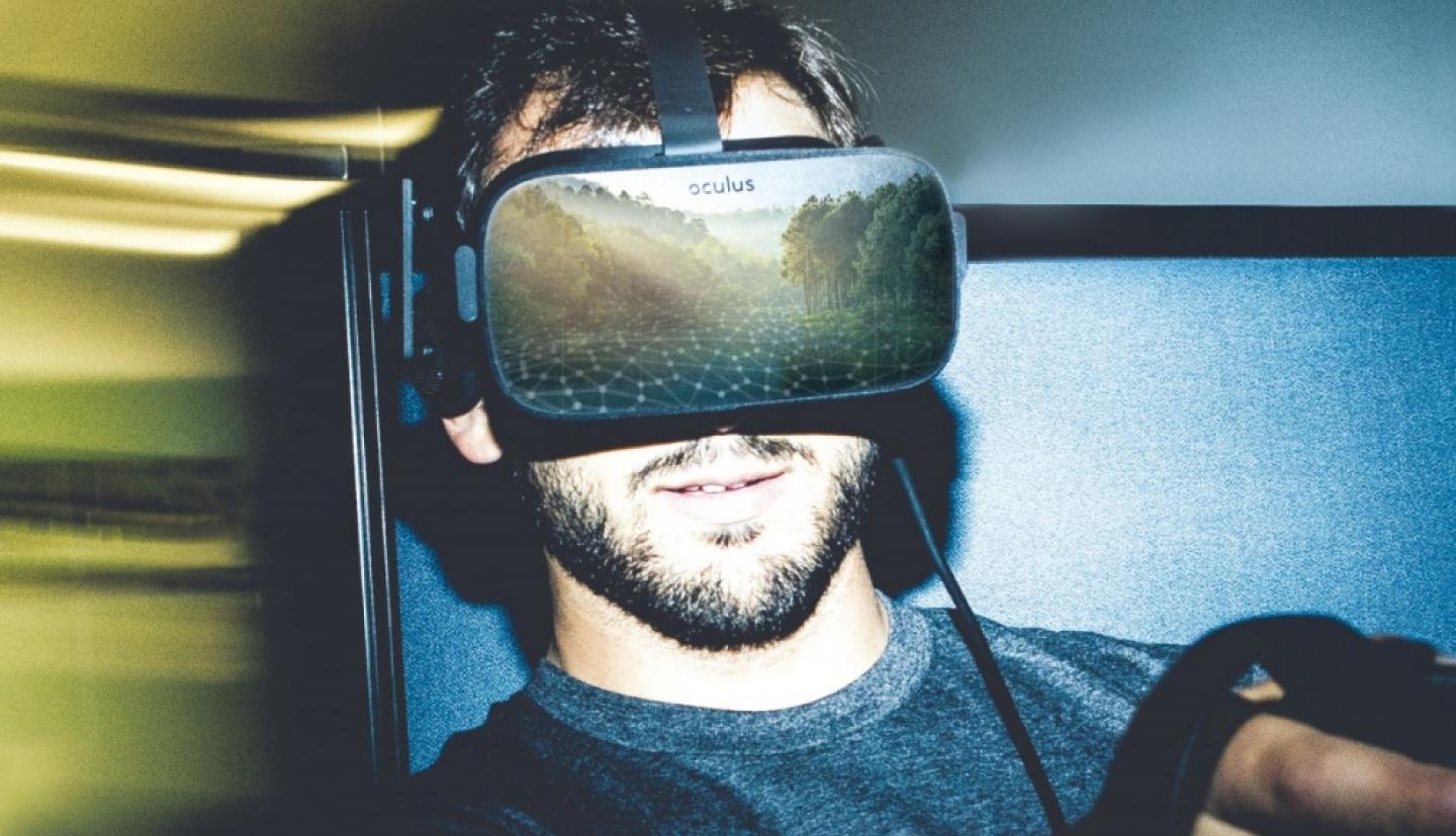 man using virtual reality headset