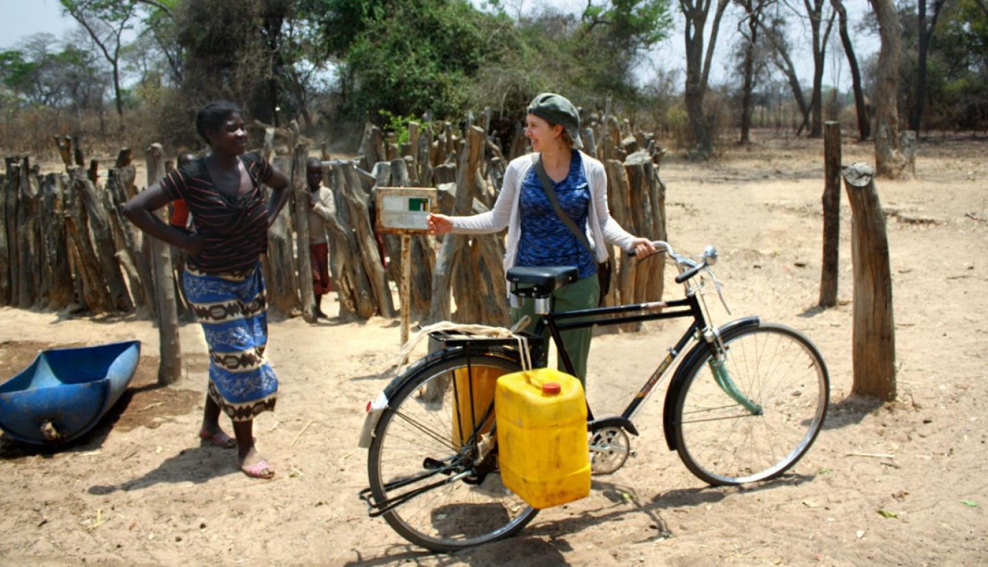 Johanne Pelletier holds a bicycle owned by a farmer.