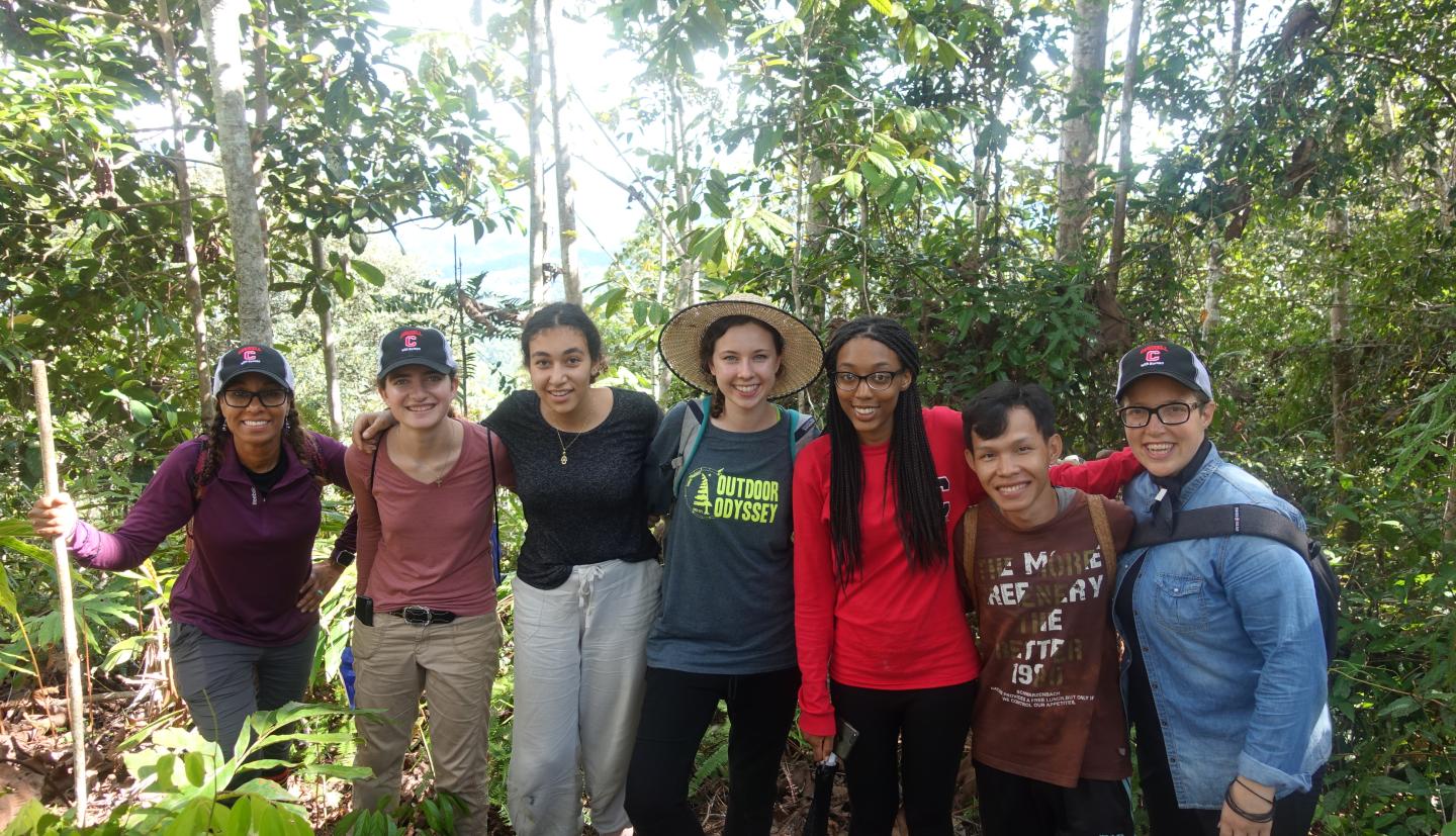 Students hike in rainforest