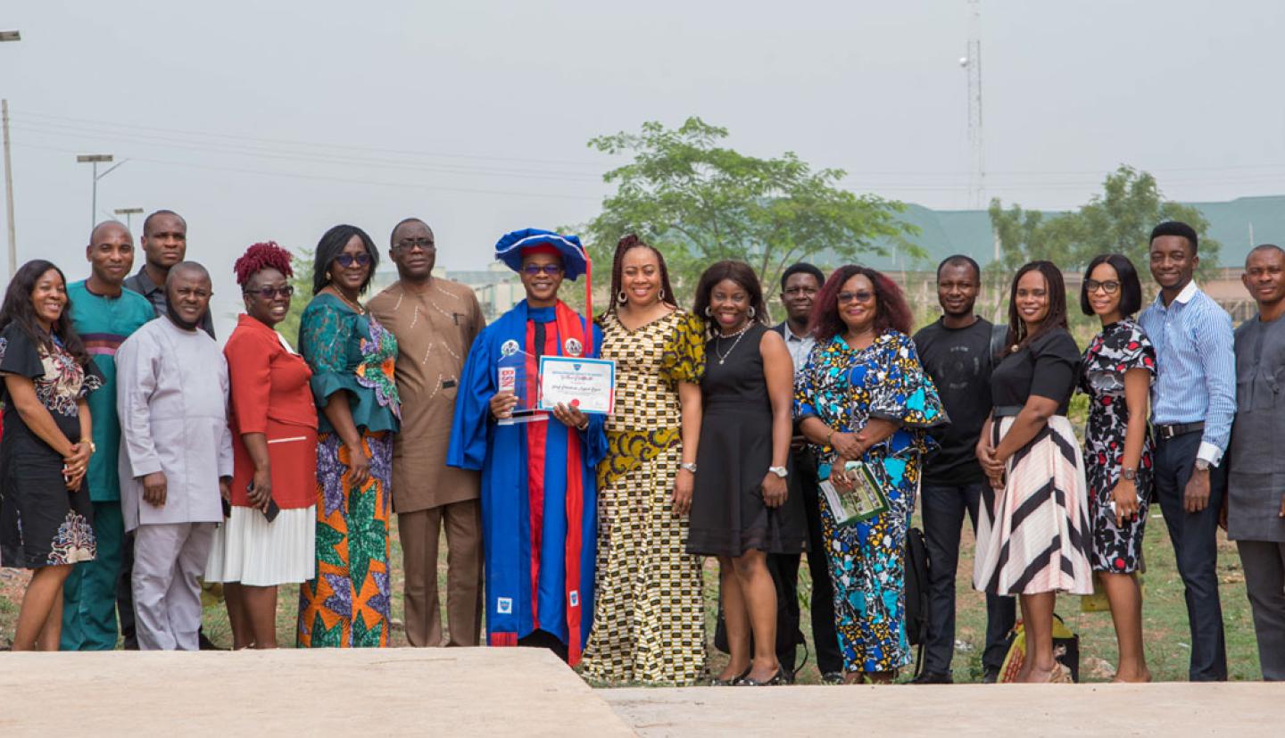A group of people standing outside