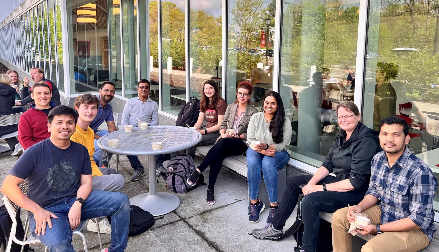 People sitting outside eating ice cream