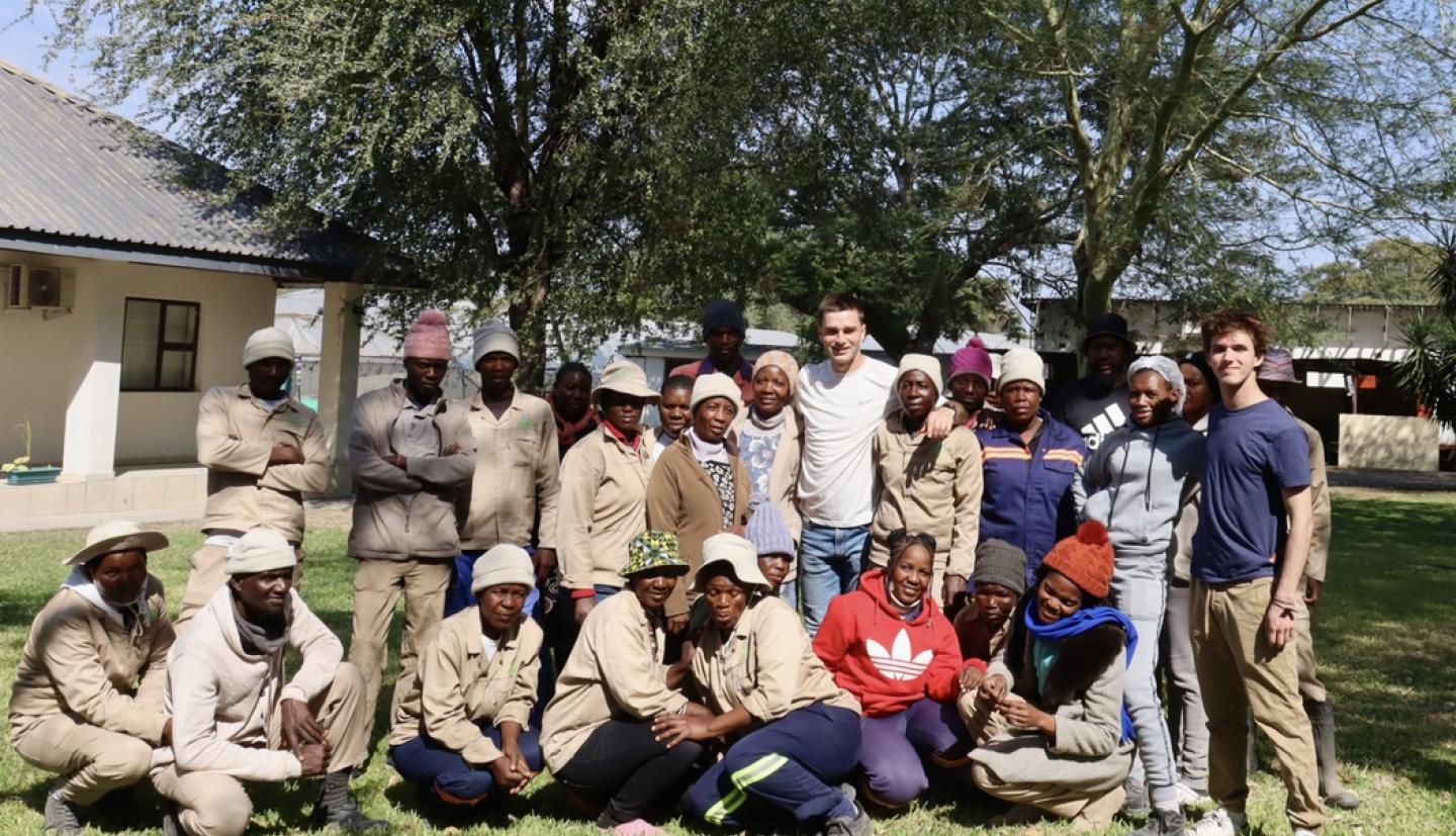 Team poses for group photo