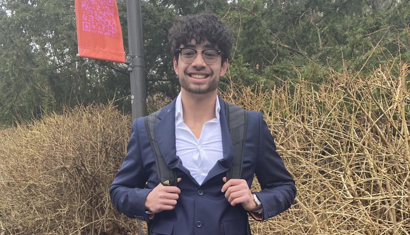 Boy standing and smiling