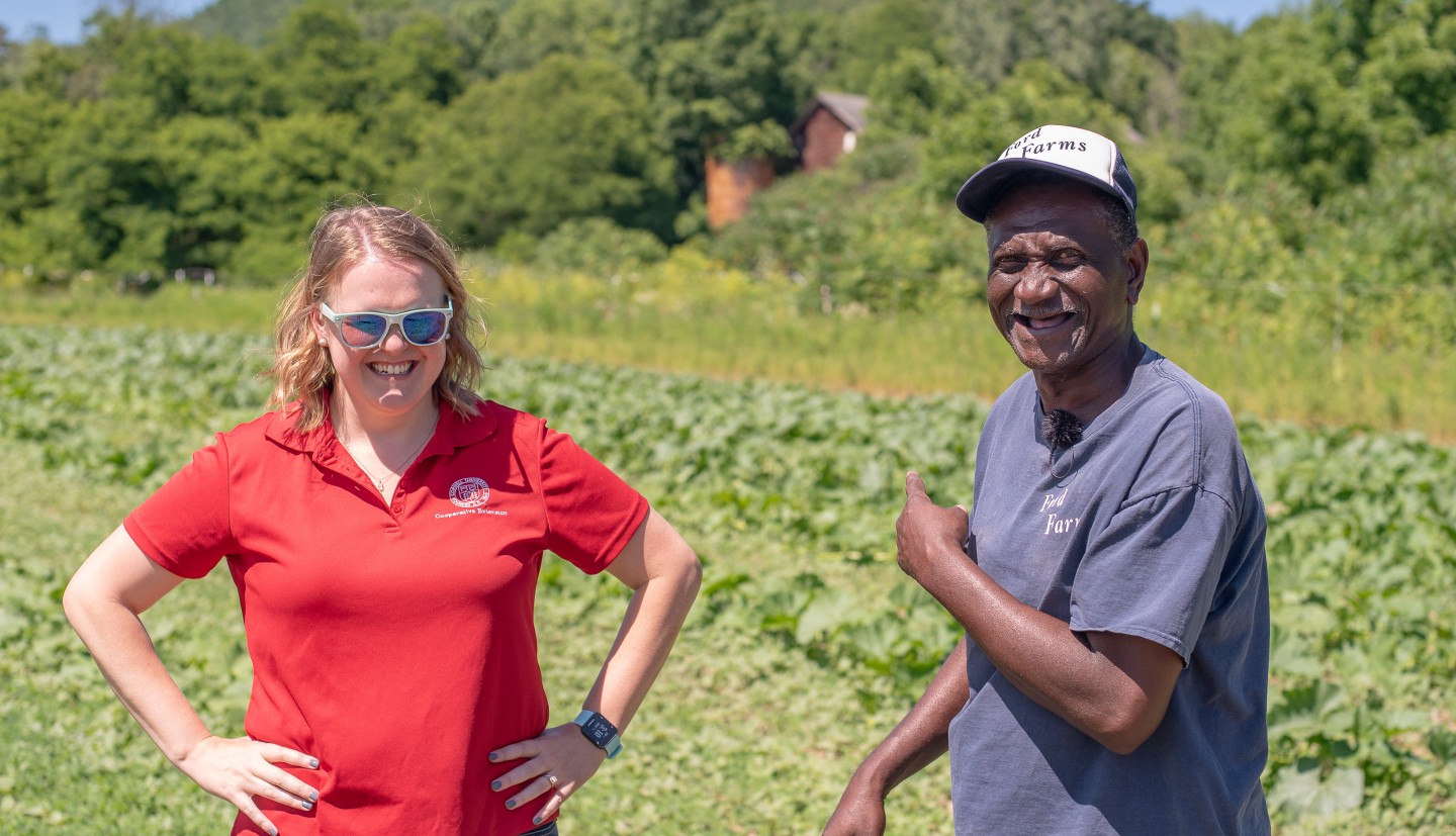 Larkin discussing an issue with a farmer