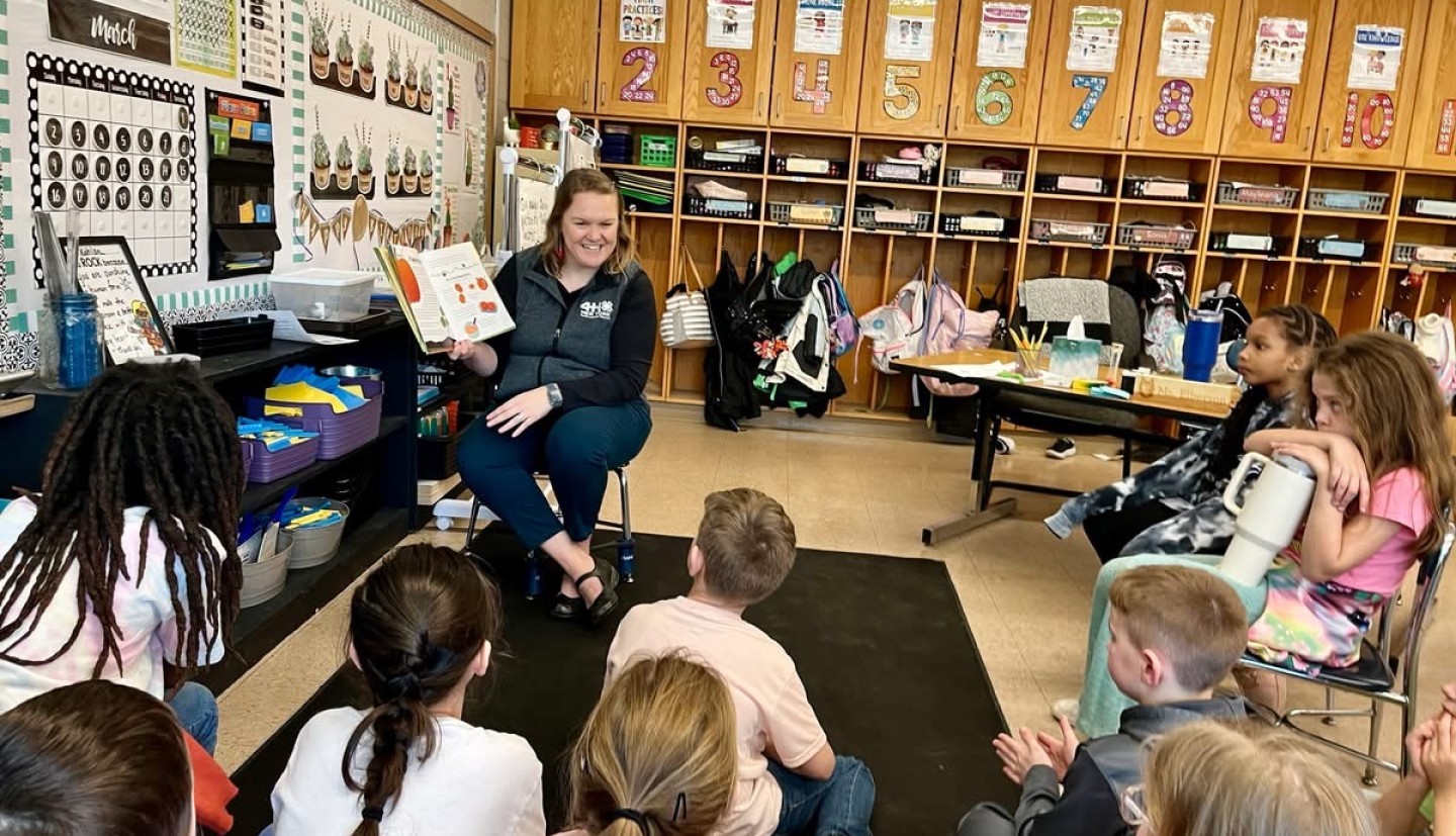 Larkin reading to children