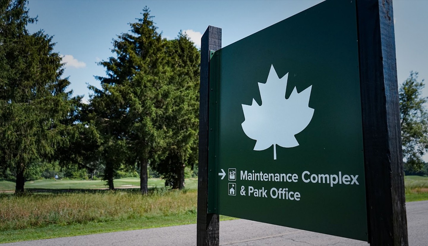 park sign with maple leaf