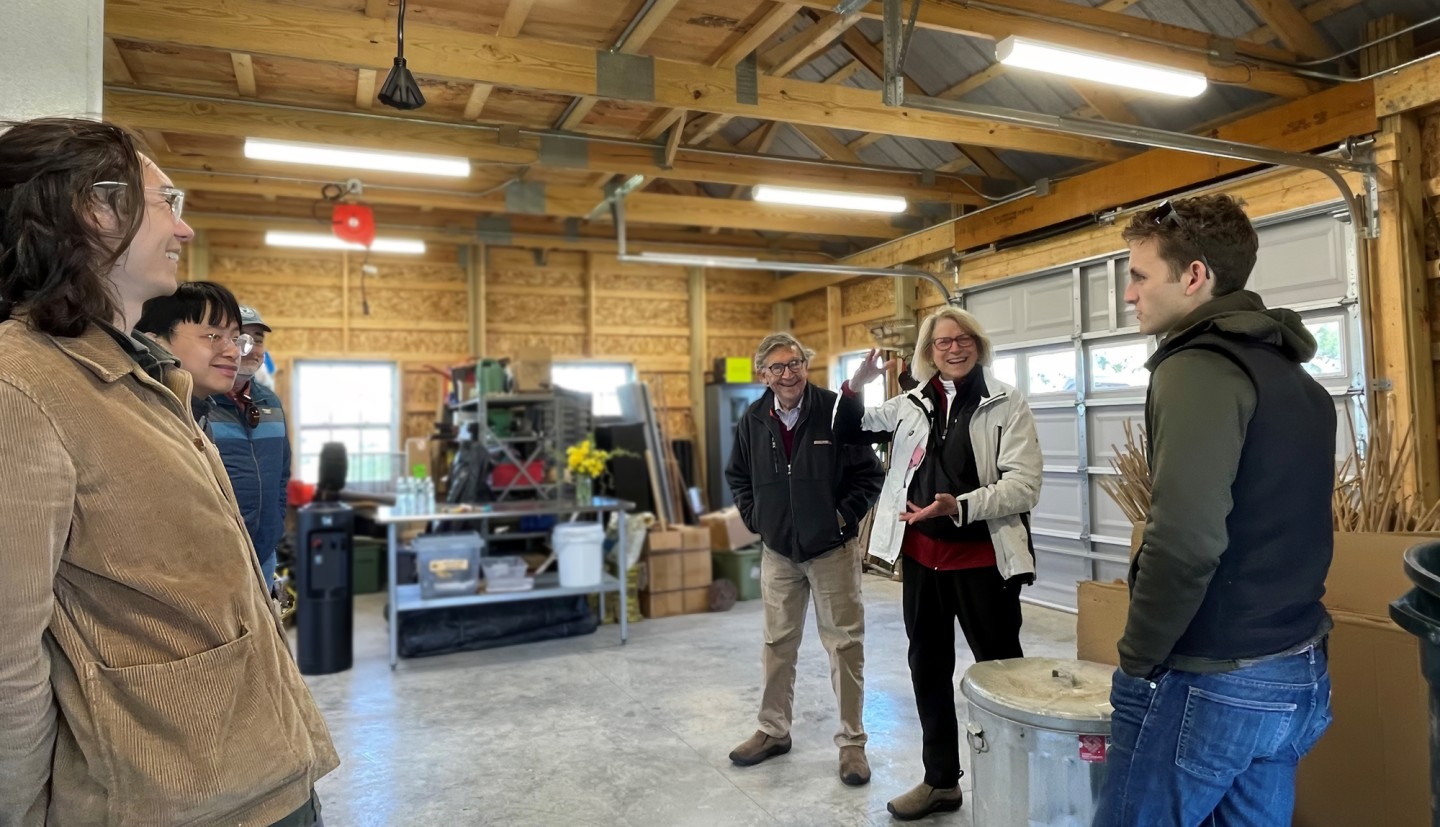 People in a working barn