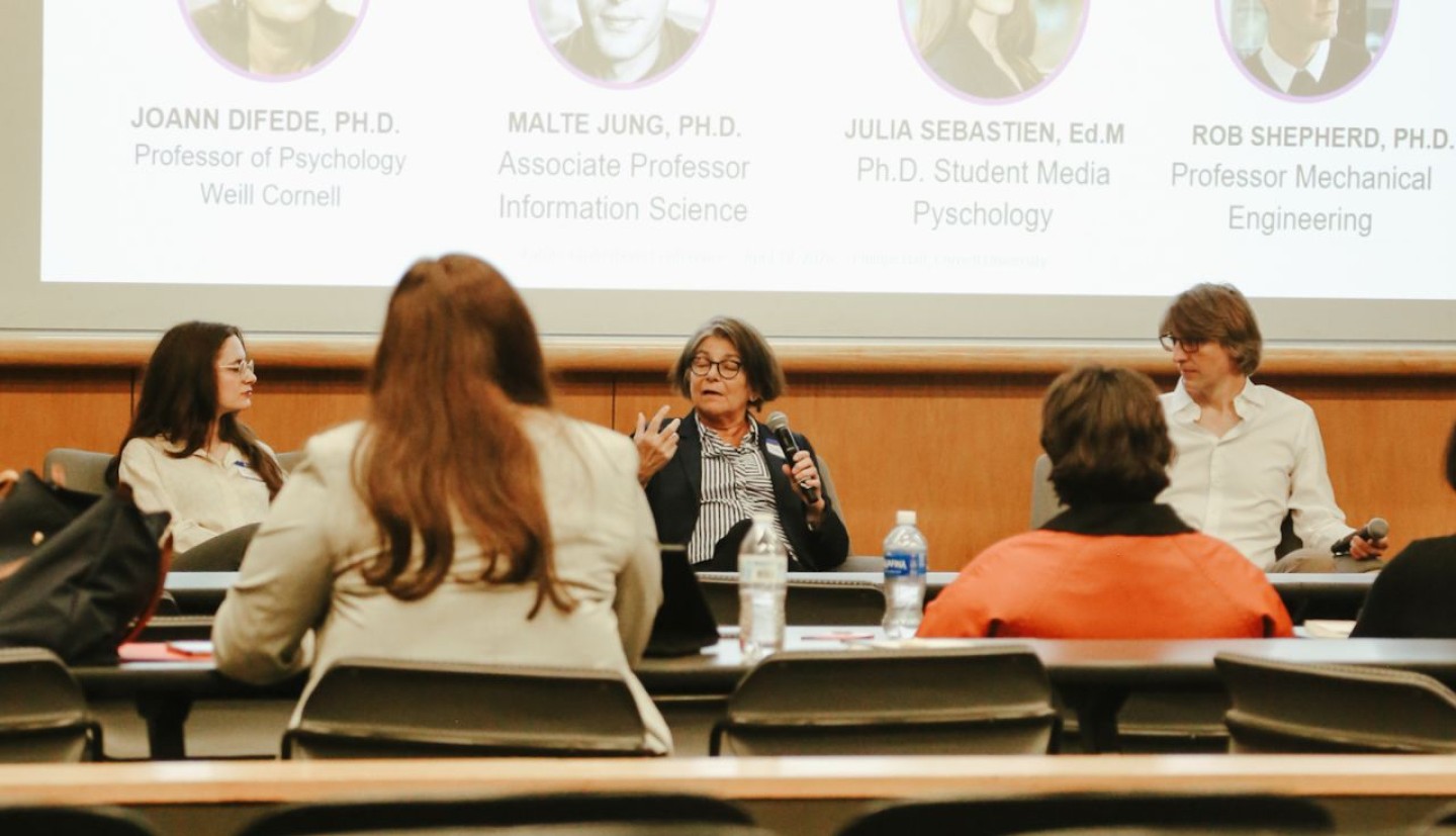 Graduate student Julia Sebastien (left) is pictured with Cornell Professor JoAnn Difede and Cornell Associate Professor Malte Jung at the “Human Psychology, Purpose and Social Life in the Age of AI and Ubiquitous Computing.”