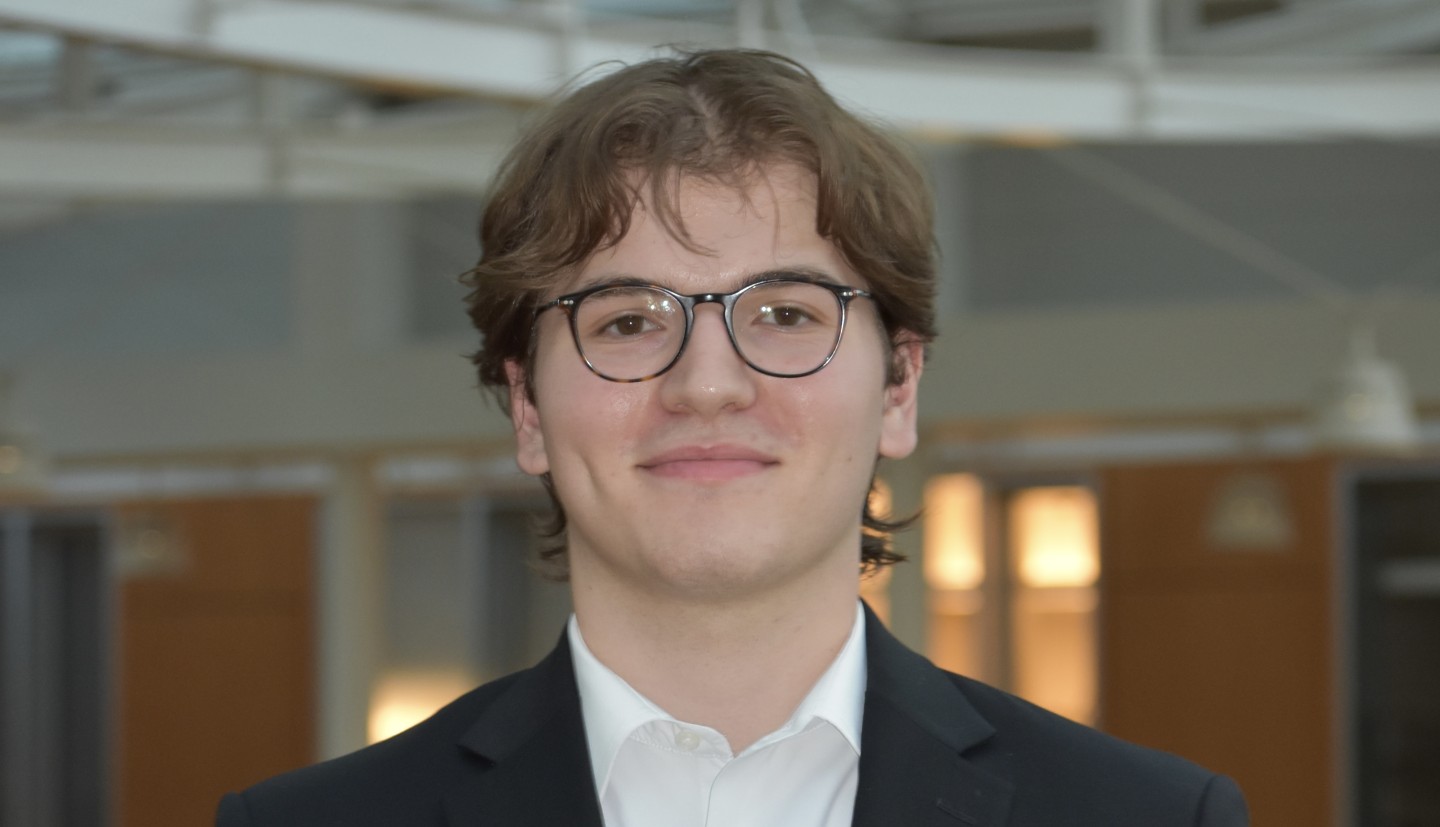 Smiling man with glasses