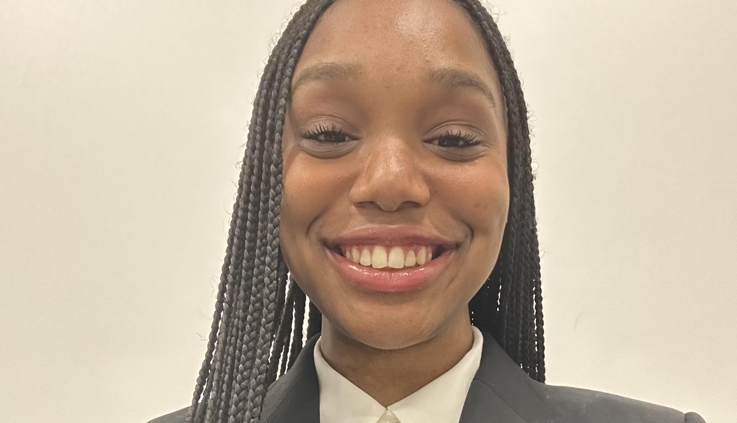 Smiling woman in suit