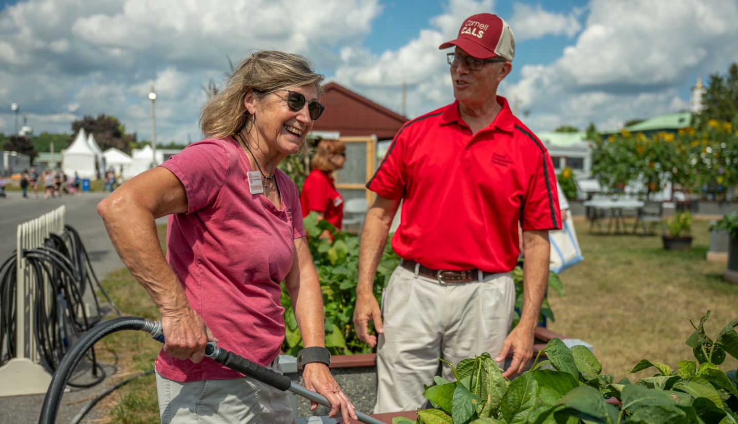 Kathy and David Skeval, CCE Onondaga Execturive Director in the Voice of the Farmer garden at the NY State Fair