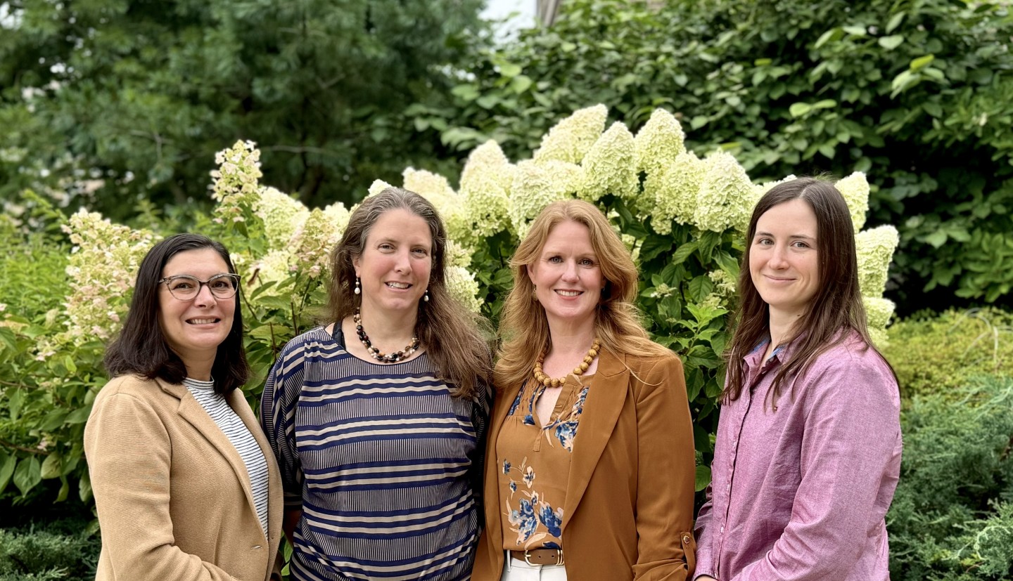 Photo of the four person career team as of August 2026