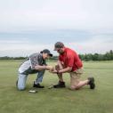 Two people on a golf course