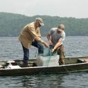 researchers haul fishing lines to collect samples