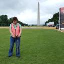 Researcher standing with the Washington Monument in the background