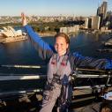 A student standing on a bridge in Australia 