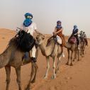 Four girls trek across the desert in Morocco on camels