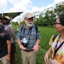 Teacher engages with two students on a trip to India