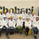People at Chobani plant wearing personal protective equipment.