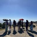 group of students look out over cliff