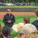 sitko talking to class on athletic field