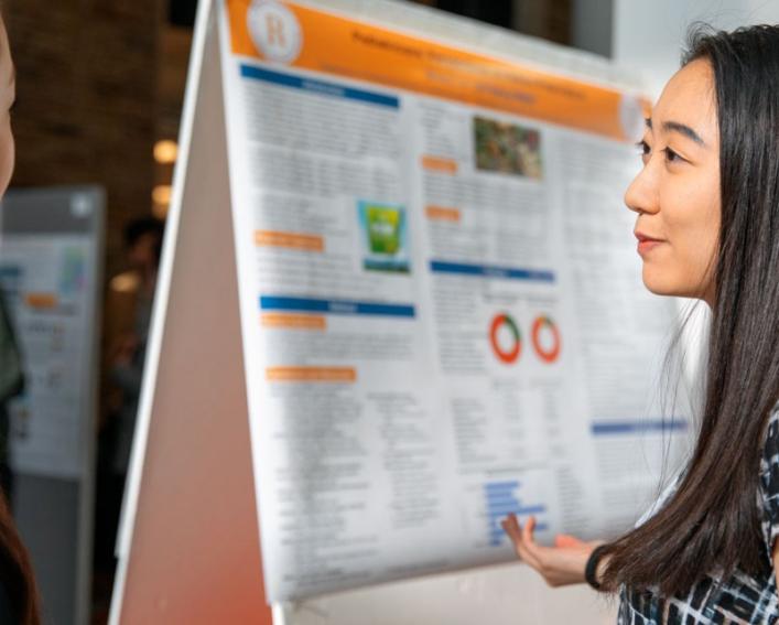 a female student presents her research