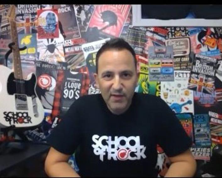 Rob Price, School of Rock CEO, in his office