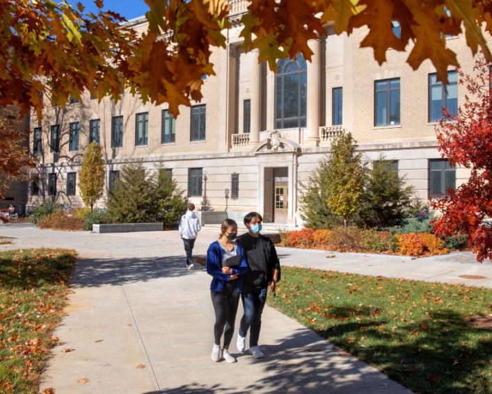 Students walking on the Ag Quad with masks on