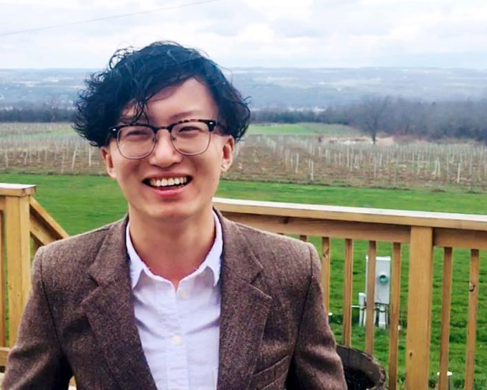 liang cheng with vinyard in background