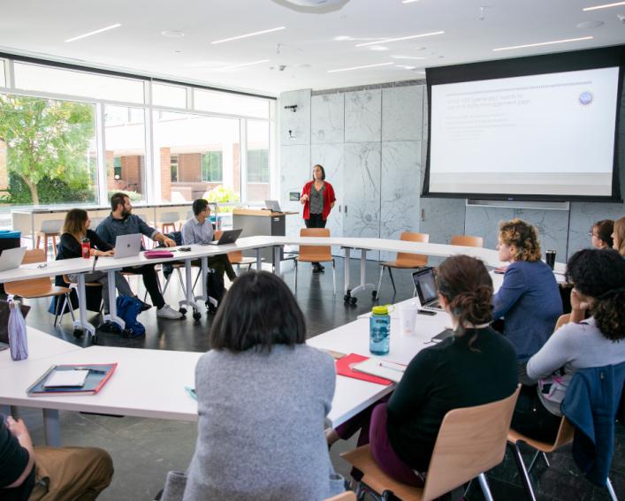 Group of faculty sitting around a conference table