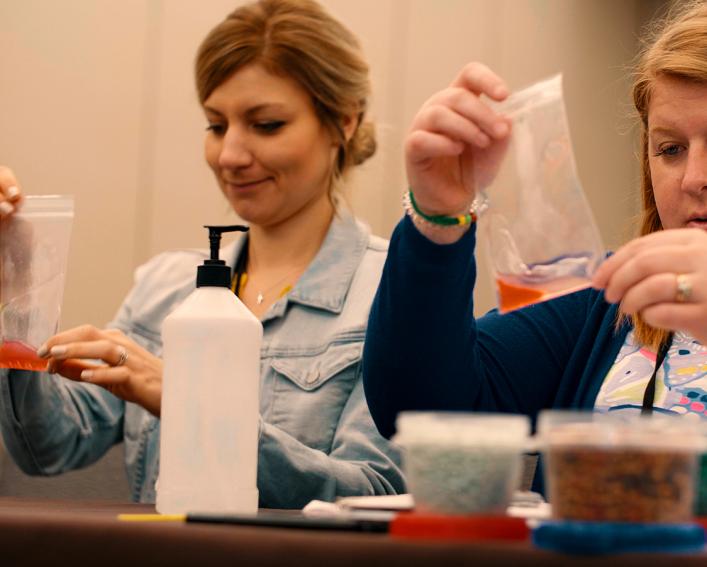 two young women doing lab work