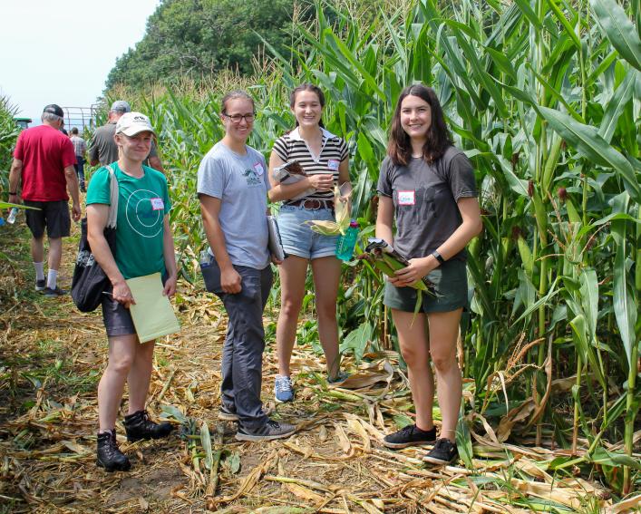Celia and other interns in corn field