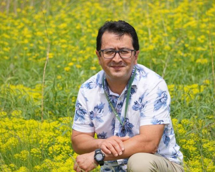 Alejandro Calixto in a field