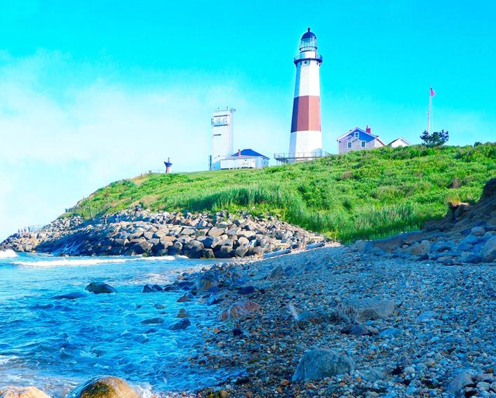 Sea shore with a lighthouse in the background