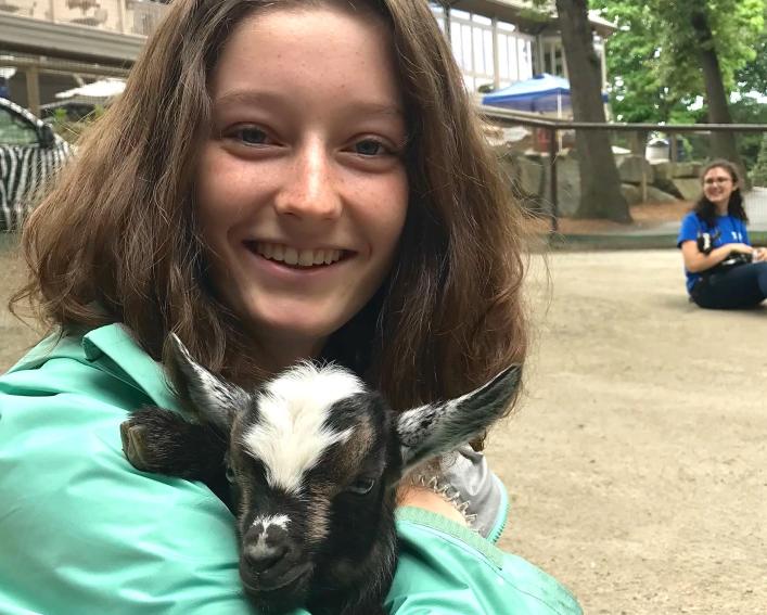 Fiona Higgins holding baby goat