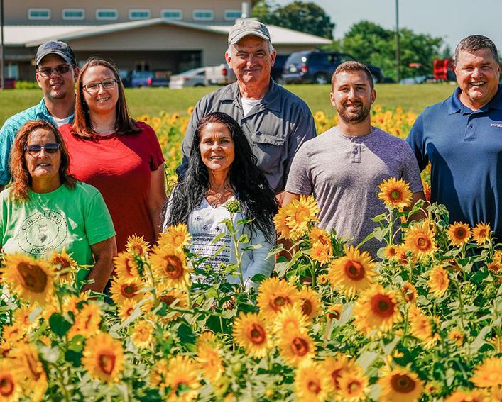 Faculty/Staff in sunflower field 