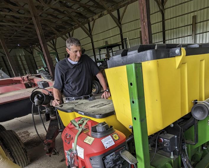 Person looking at farm equipment