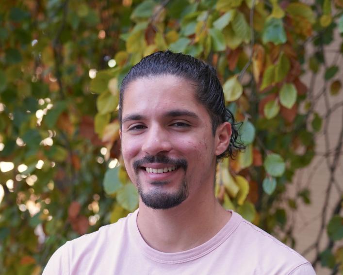 Man smiling at the camera.