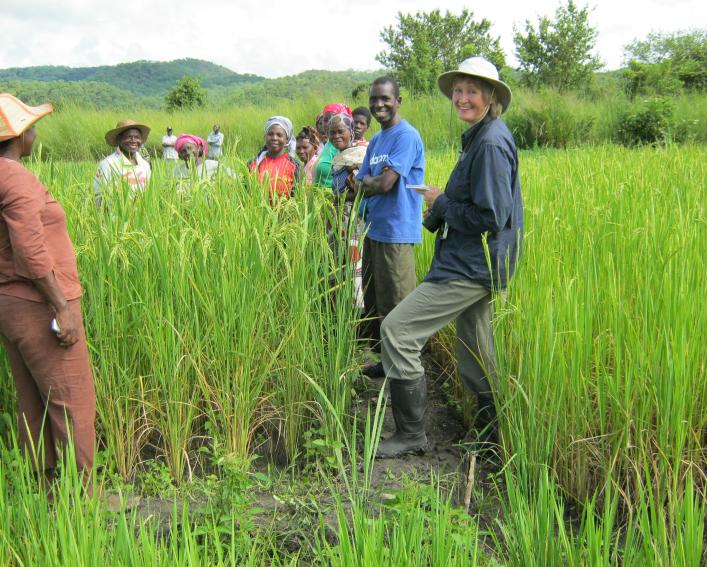 Group stands in field